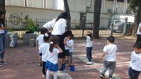 Image may contain: 1 person, standing and outdoor